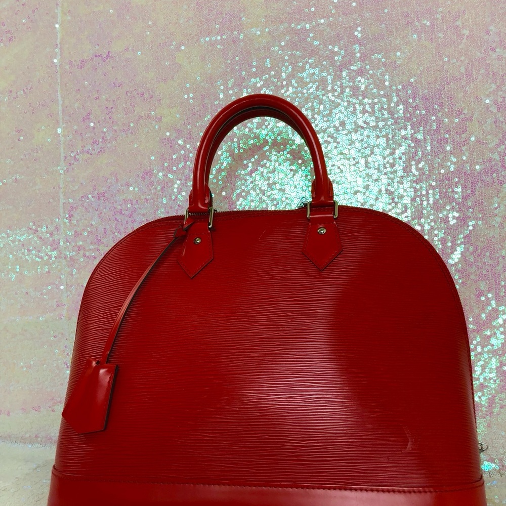 Red EPI LEATHER ALMA PM LOUIS VUITTON BAG